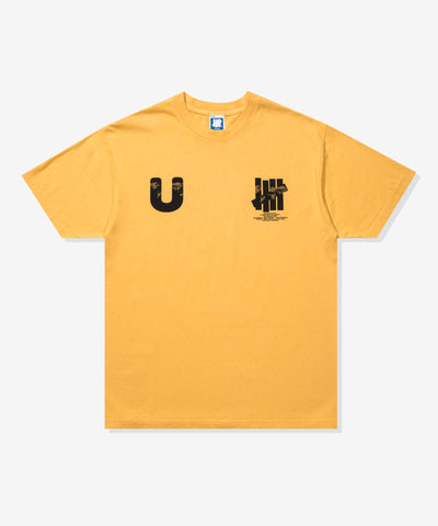 UNDEFEATED COMM S/S TEE MARIGOLD