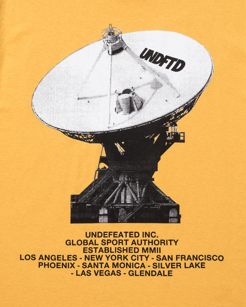 UNDEFEATED COMM S/S TEE MARIGOLD