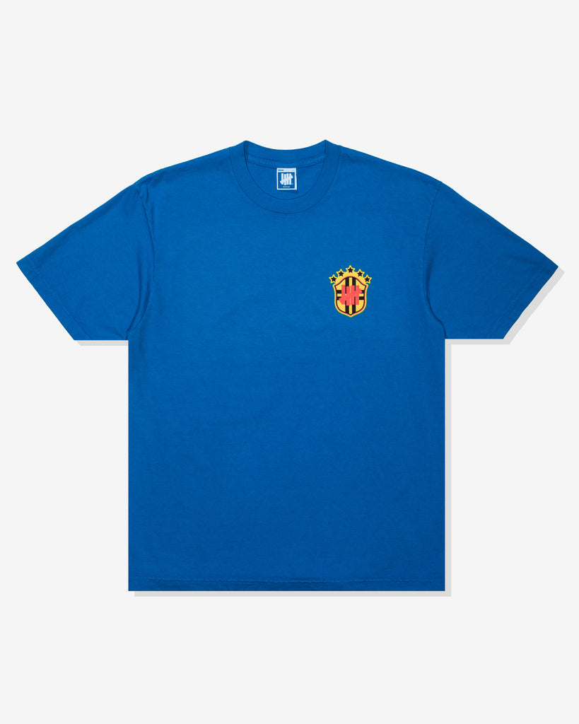 UNDEFEATED SP26 EMBLEM S/S TEE-BLUE