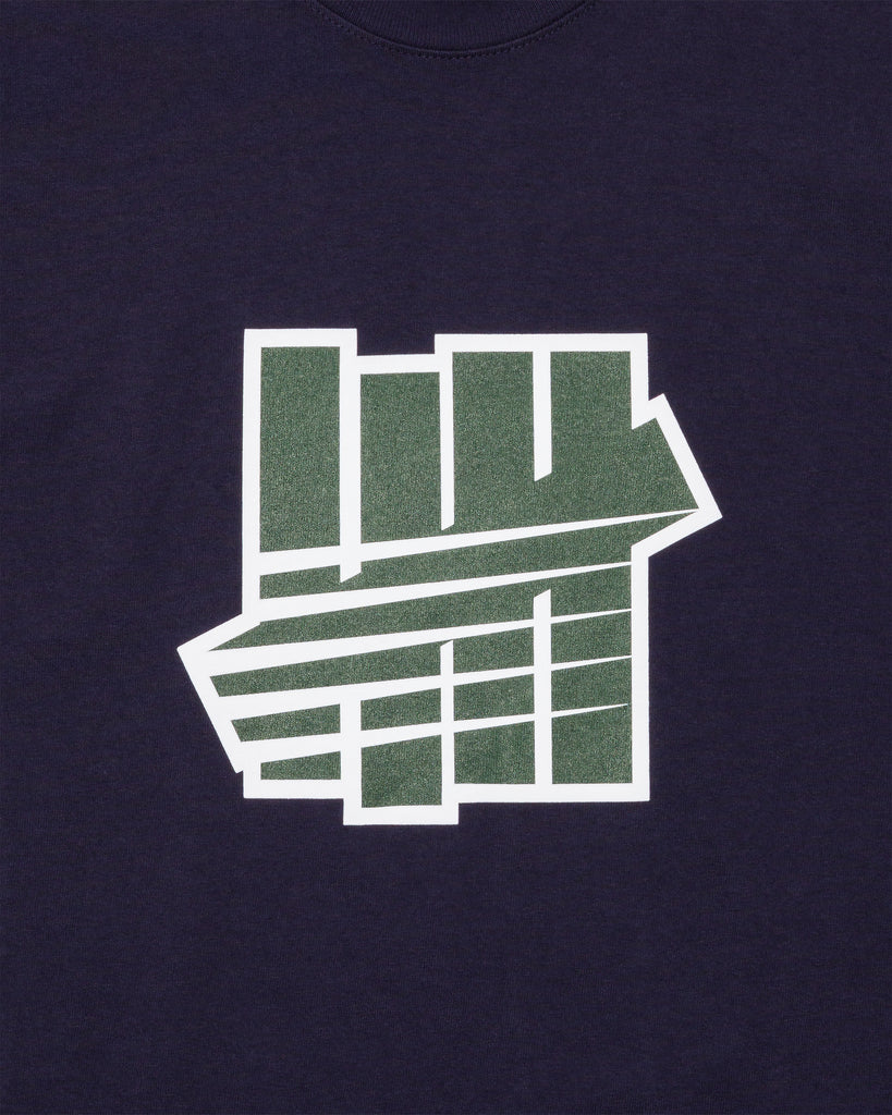 SU26 UNDEFEATED ICON CREST S/S TEE - NAVY