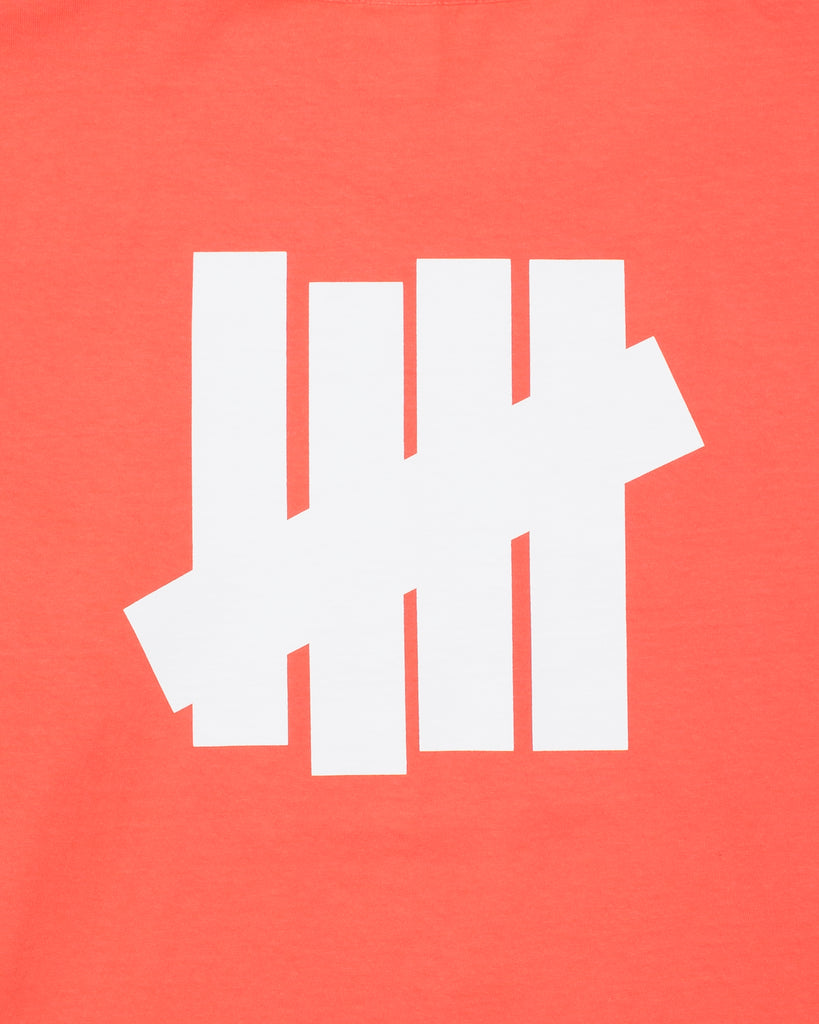 UNDEFEATED SP26 ICON L/S TEE-CORAL