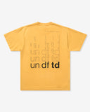 UNDEFEATED PROCESS S/S TEE MARIGOLD