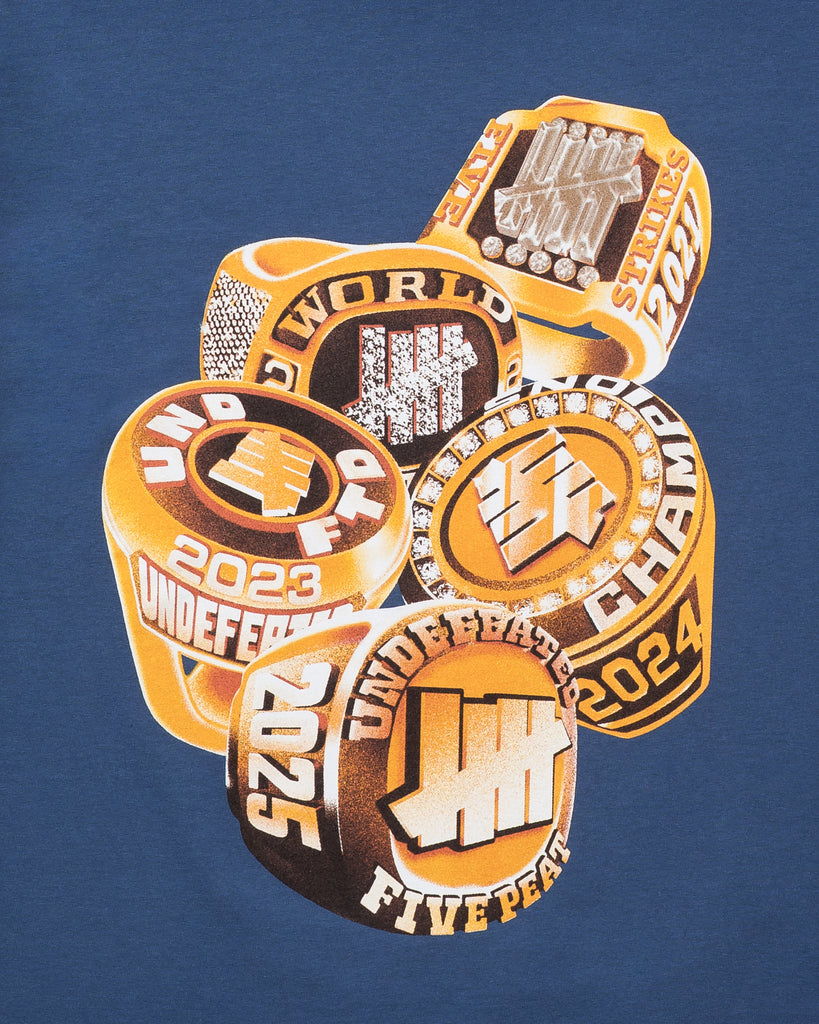 UNDEFEATED RINGS S/S TEE DARK - TEAL