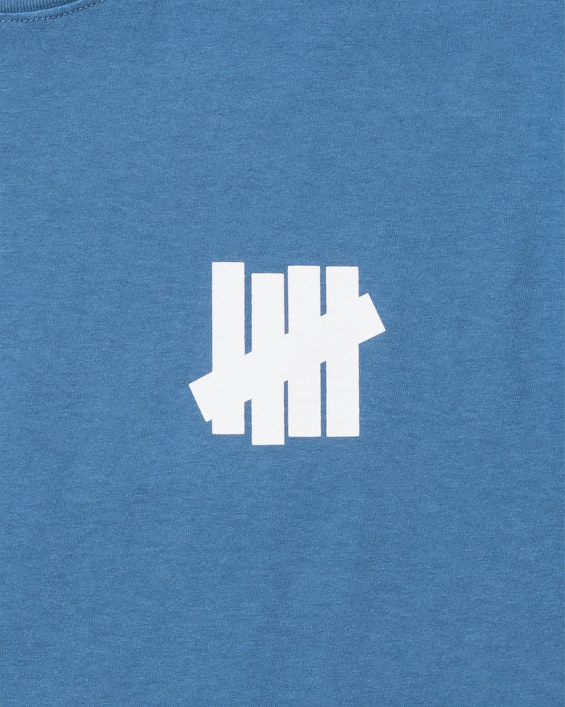 UNDEFEATED SOUND S/S TEE CORNFLOWER