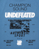 UNDEFEATED SOUND S/S TEE CORNFLOWER