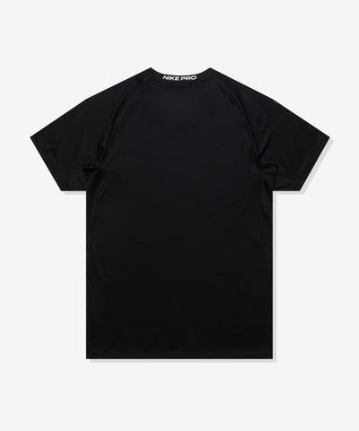 UACTP X NIKE NRG DF SLIM SS TOP - BLACK