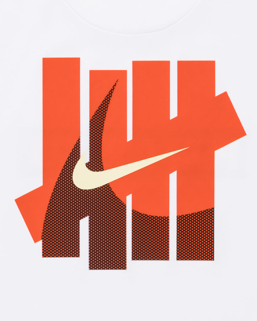 UACTP X NIKE NRG PRIMARY SS TOP - WHITE