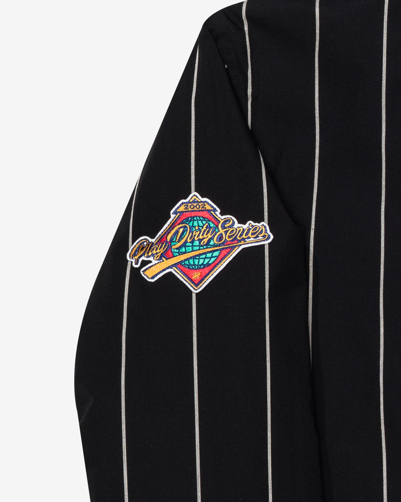 UNDEFEATED SP26 BASEBALL JACKET - BLACK