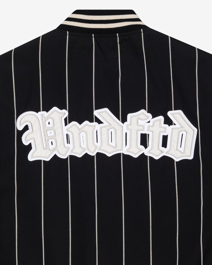 UNDEFEATED SP26 BASEBALL JACKET - BLACK