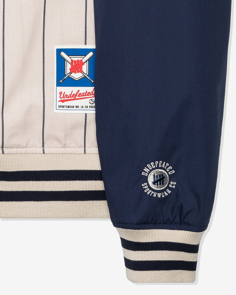 UNDEFEATED SP26 BASEBALL JACKET - GREY