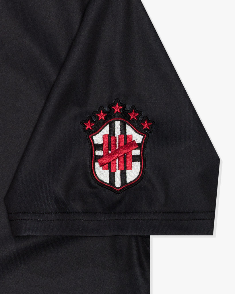 UNDEFEATED SP26 ICON SOCCER JERSEY - BLACK