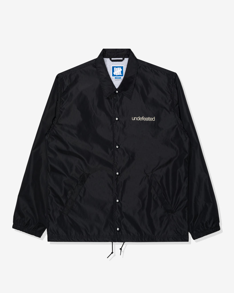 UNDEFEATED SP26 INC. COACHES JACKET - BLACK