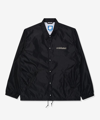 UNDEFEATED SP26 INC. COACHES JACKET - BLACK
