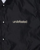 UNDEFEATED SP26 INC. COACHES JACKET - BLACK
