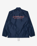 UNDEFEATED SP26 INC. COACHES JACKET - NAVY