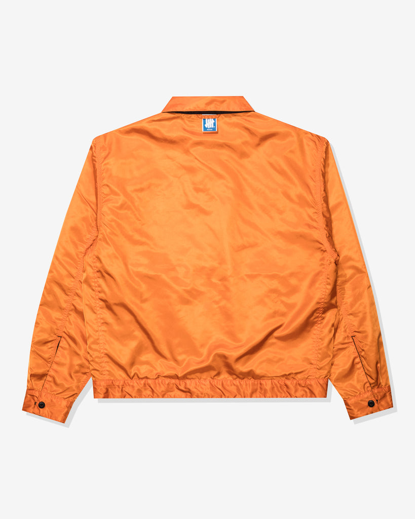 FA26 UNDEFEATED REVERSIBLE TRUCKER JACKET - BLACK