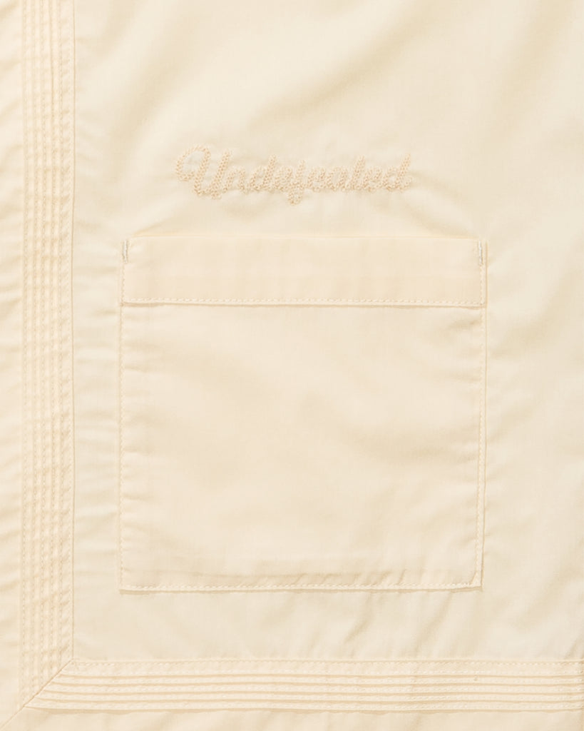 UNDEFEATED SCRIPT S/S SHIRT BUTTER