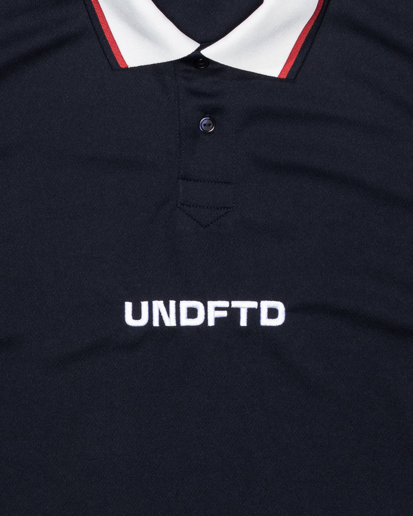 UNDEFEATED SP26 S/S ATHLETIC POLO - NAVY
