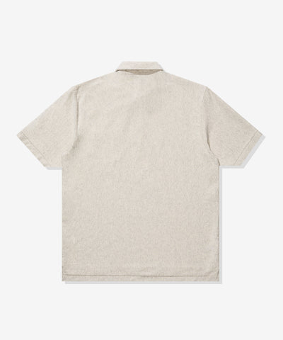 UNDEFEATED FA25 S/S POLO TEE-HEATHER-OATMEAL