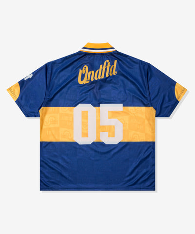 UNDEFEATED SU26 S/S SOCCER POLO - DARK BLUE