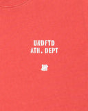 UNDEFEATED STENCIL S/S TEE SCARLET