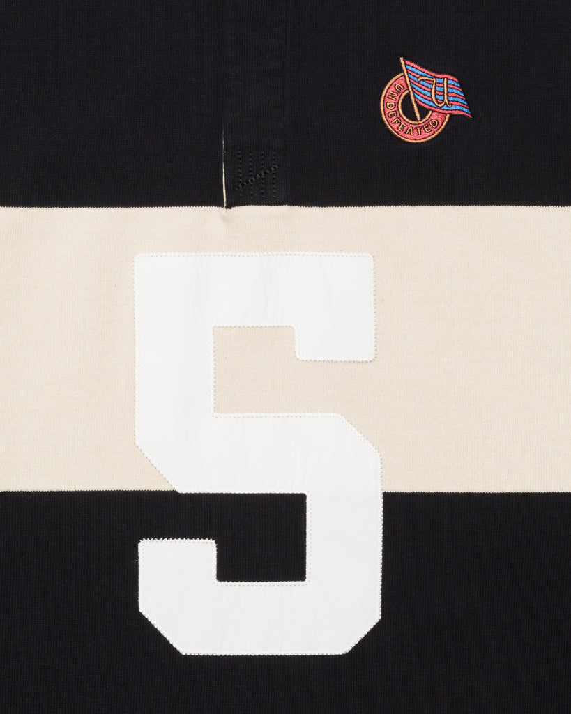 FA26 UNDEFEATED STRIPED L/S RUGBY - BLACK