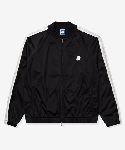 UNDEFEATED TAPED TRACK JACKET - BLACK